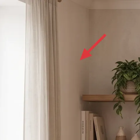 light beige curtain panels (window side)