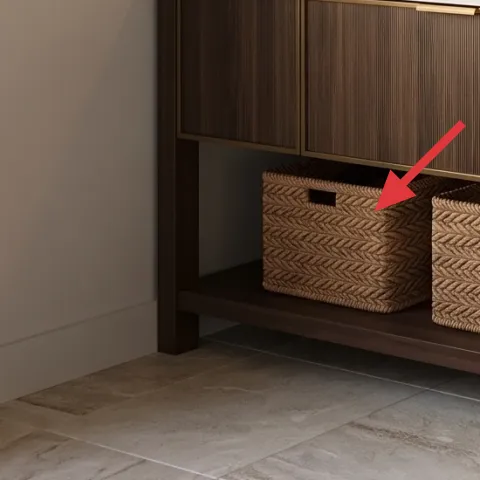 Woven wicker storage baskets under vanity