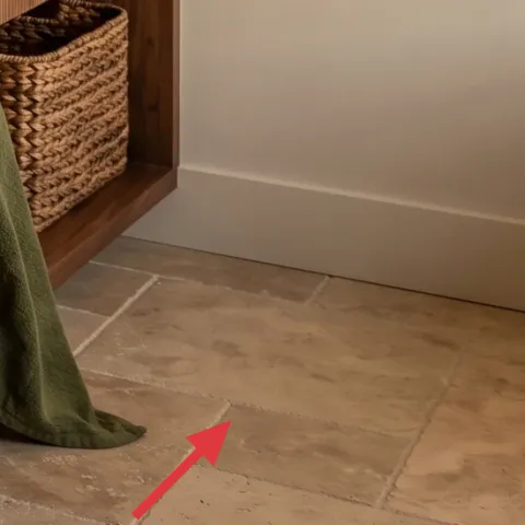 Draped green towel over a basket