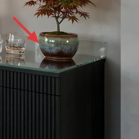 green ceramic bowl on bar countertop