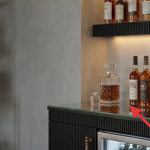 copper/brass pitcher on shelving