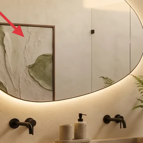 round wall mirror with dark frame