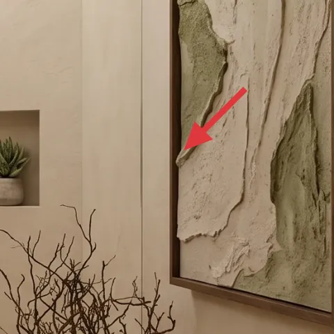 framed abstract artwork on right wall