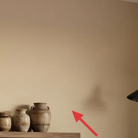 three ceramic jars on shelf