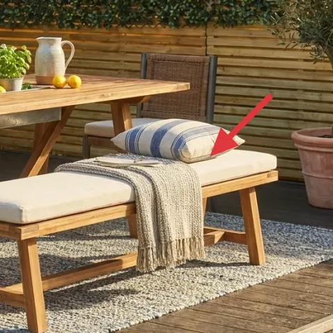 gray throw blanket on bench