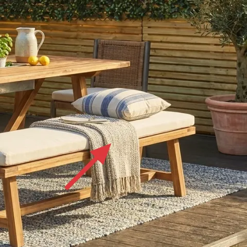 cream cushion on bench