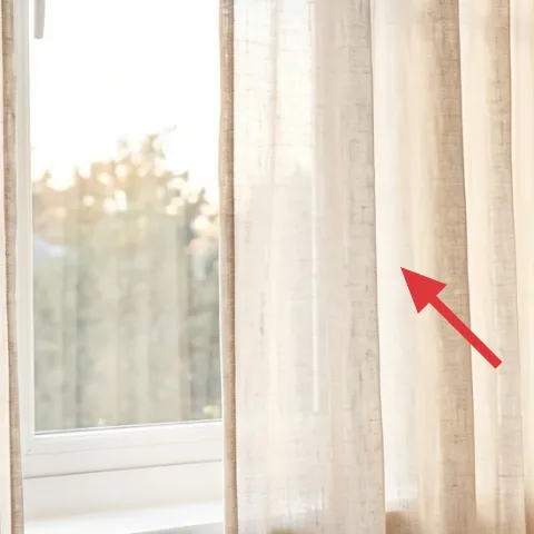 sheer beige curtain panel pair