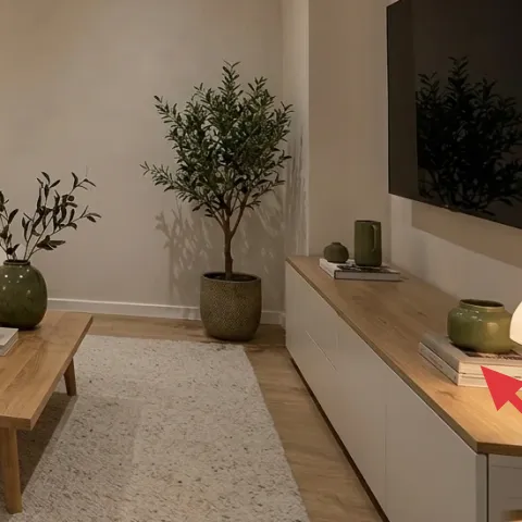 warm table lamp on the right console