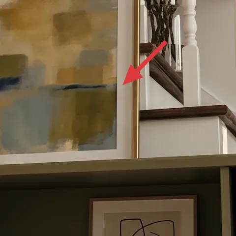 framed abstract print in gold frame