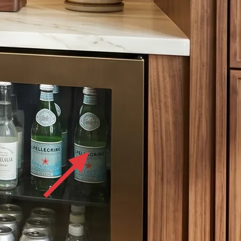 Apothecary-style bottle labels on wine bottles