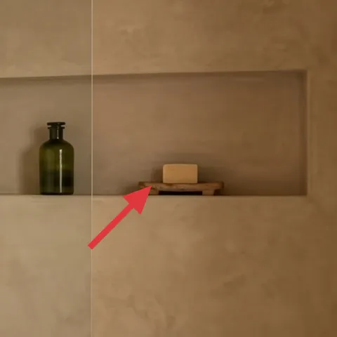 Peel-and-stick wallpaper on wall niche back panel