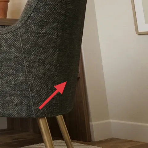 gray upholstered armchair