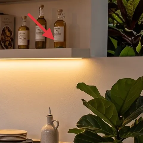 right floating shelf with books and bottles